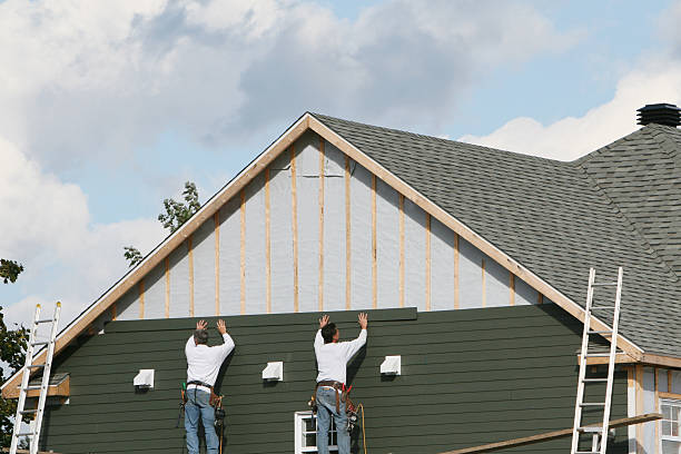 Professional Siding technician working in Columbia, TN